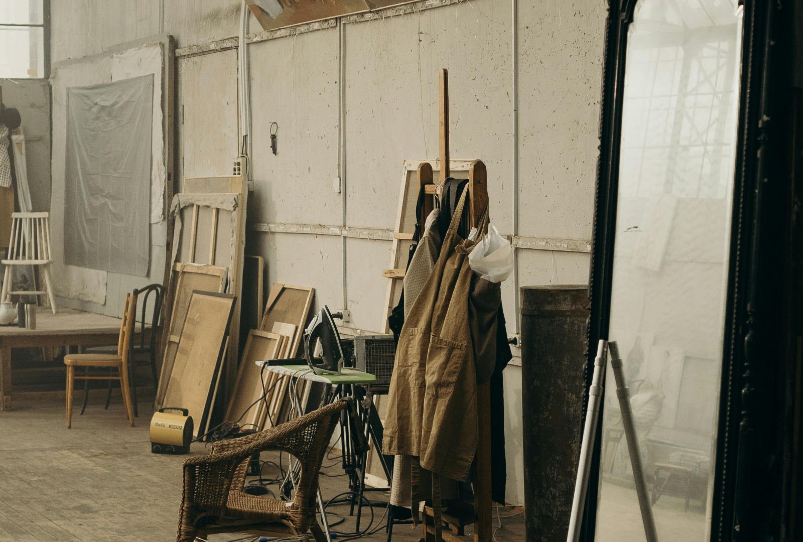 Artist studio with large canvases, easels and painting materials for Yale Painting Printmaking MFA portfolio preparation.