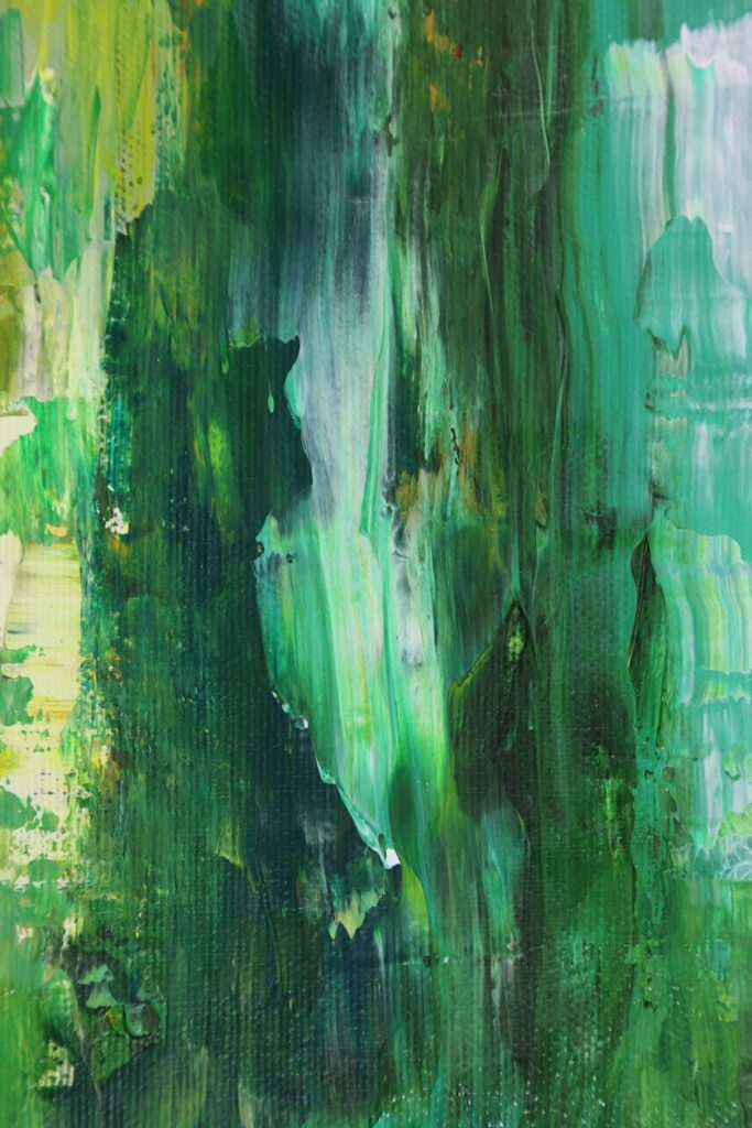 Close-up of green and white acrylic paint texture, for applicants meeting the Camberwell fine art portfolio requirements