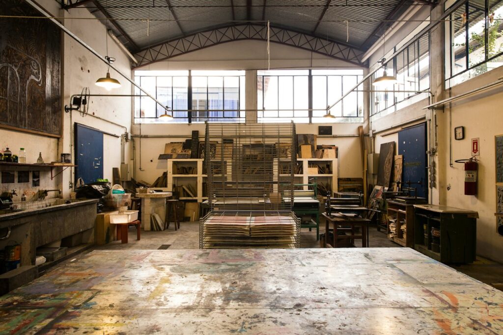 Large workshop with benches, materials and high windows, for applicants meeting the RCA MA Sculpture portfolio requirements